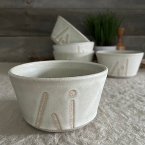 Handmade stoneware pottery. White cereal bowl with lines and dot accents.