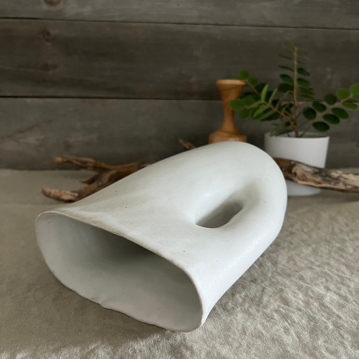 Handmade stoneware pottery. White modern hole vase/pitcher.