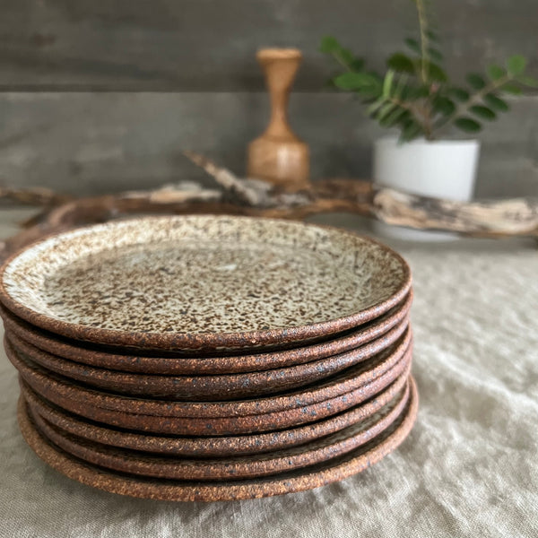 Handmade stoneware pottery. White speckled appetizer plates.