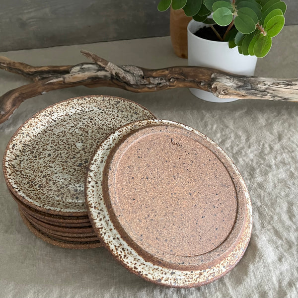 Handmade stoneware pottery. White speckled appetizer plates.