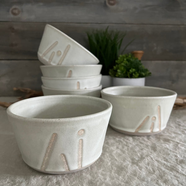 Handmade stoneware pottery. White cereal bowl with lines and dot accents.