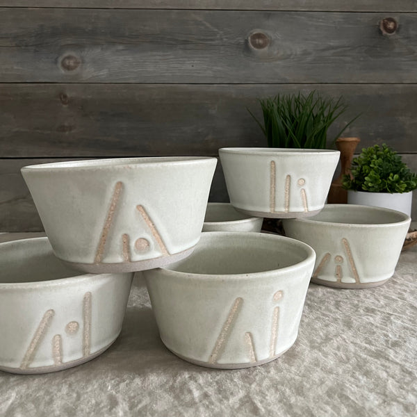 Handmade stoneware pottery. White cereal bowl with lines and dot accents.