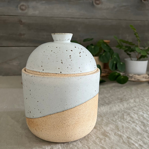 Handmade stoneware pottery. White speckled lidded canister.