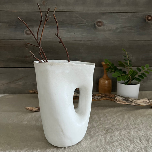 Handmade stoneware pottery. White modern hole vase/pitcher.