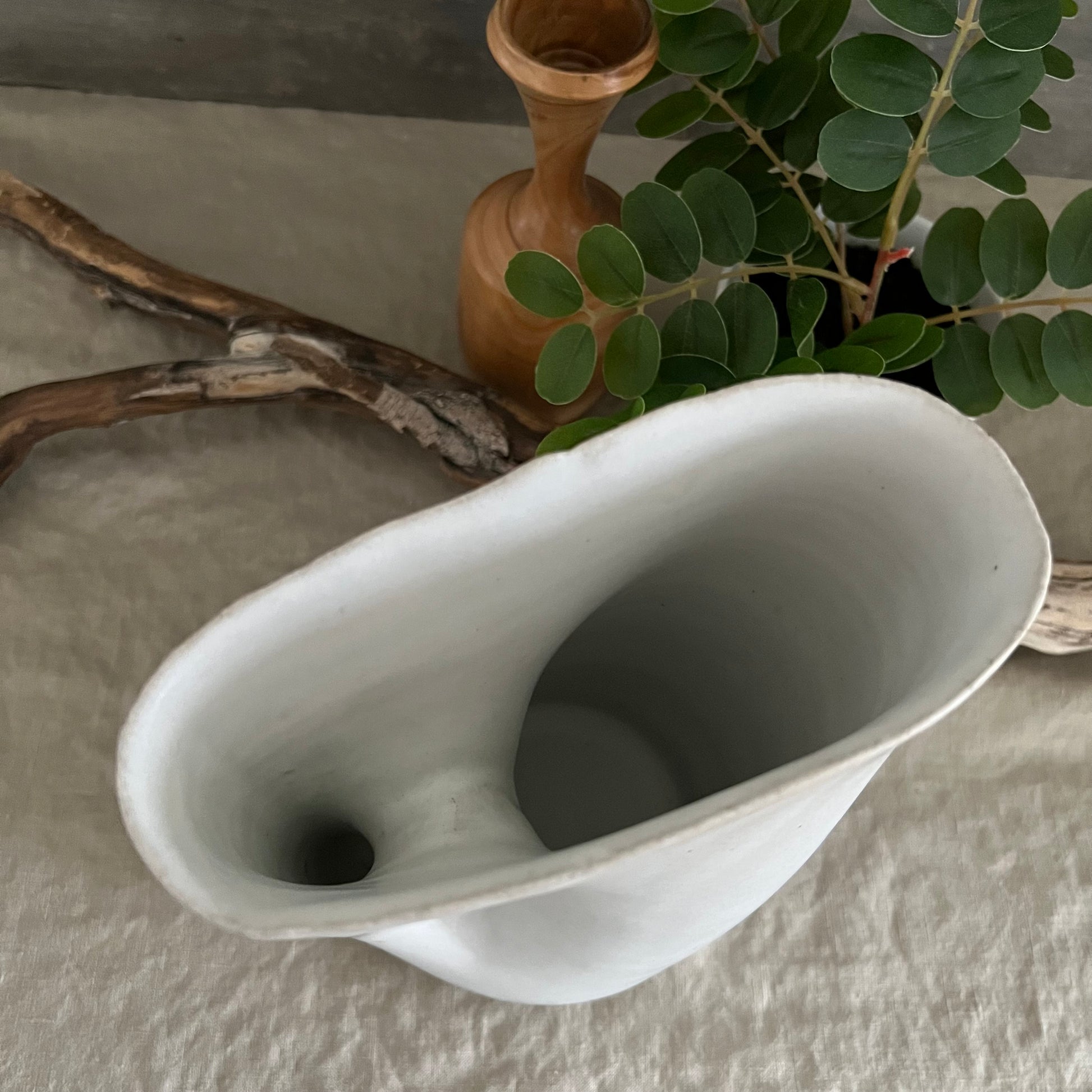 Handmade stoneware pottery. White modern hole vase/pitcher.