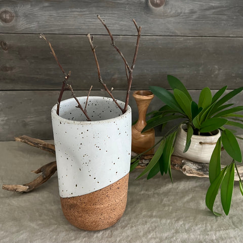 Handmade stoneware pottery. White speckled squish vase.